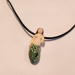 Small Red Headed Pale Skin Mermaid on leather necklace with clasp